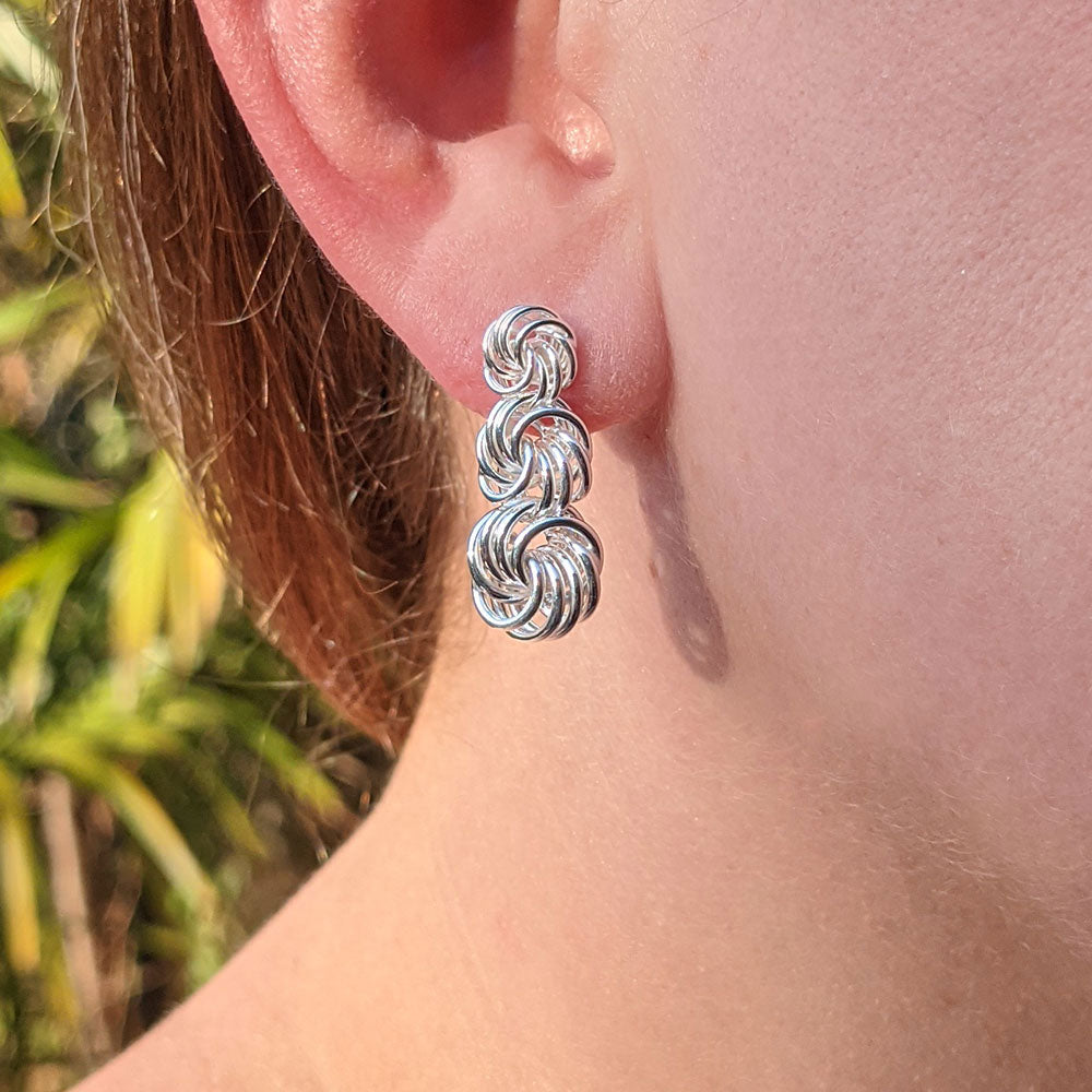 sterling silver graduated knot drop earrings