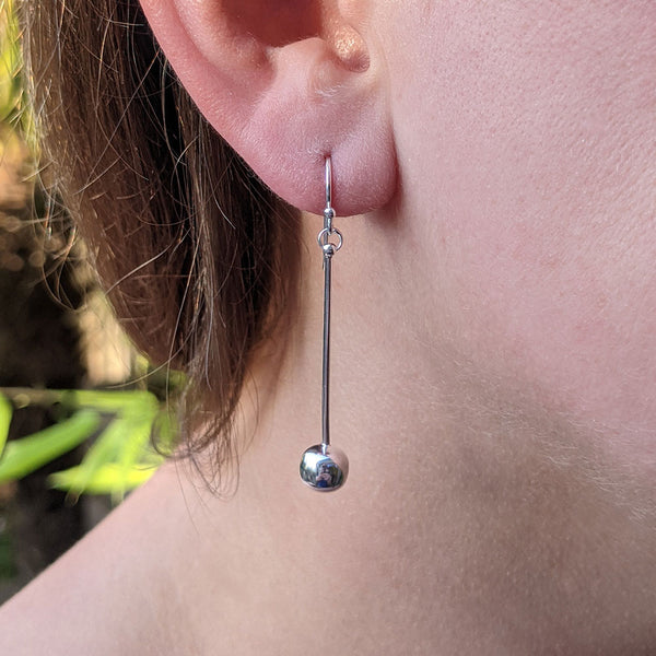 Sterling silver hanging 2025 ball earrings