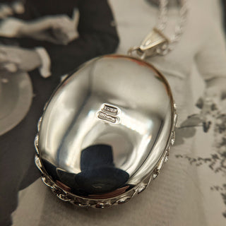 reverse side of locket with British hallmark