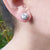 silver knot studs in ear