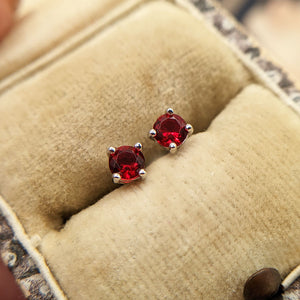 red gemstone earrings in sterling silver