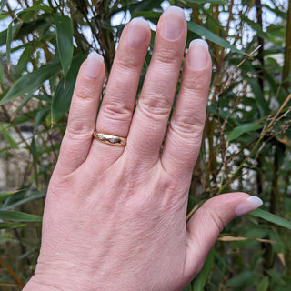 gold trilogy three stone gypsy ring on hand