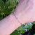 paperclip bracelet on woman's wrist