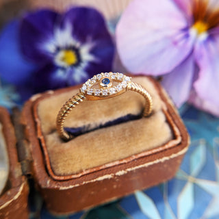 evil eye ring in solid yellow gold